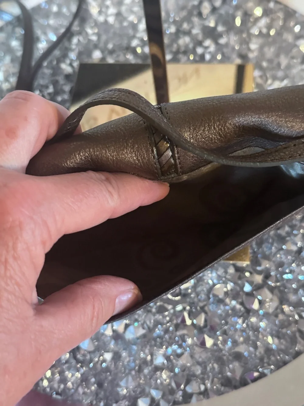 EUC metallic leather crossbody organizer by Brighton.